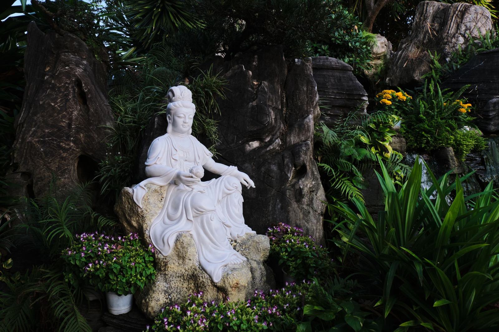 A white Buddhist statue at a pagoda near Da Nang