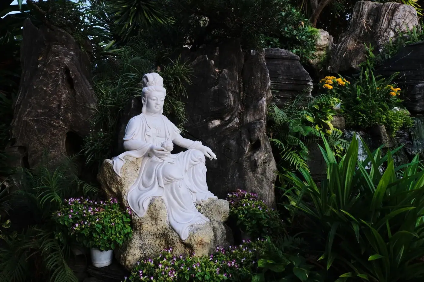 A white Buddhist statue at a pagoda near Da Nang