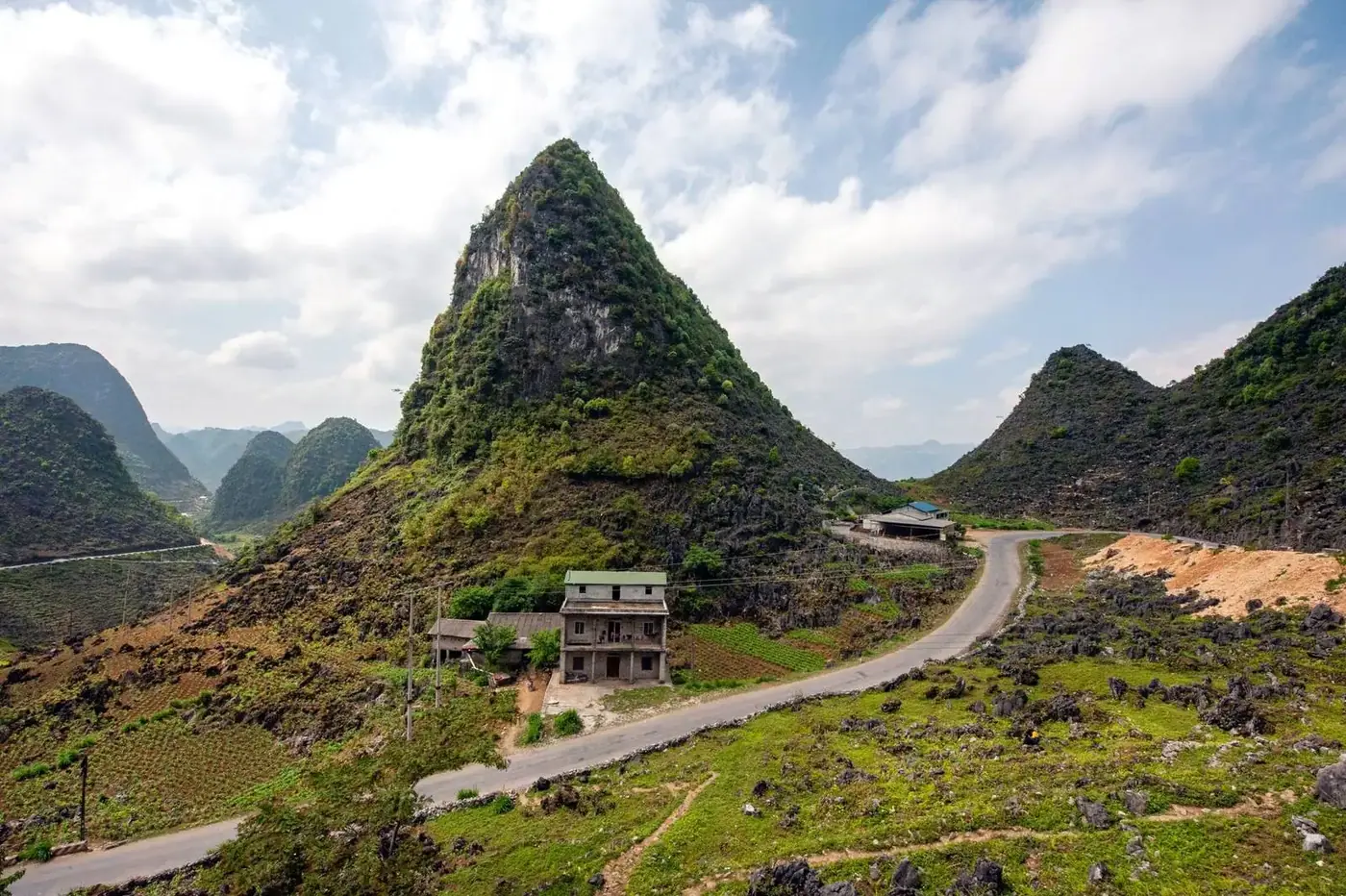 Karst peaks and a mountain road in Ha Giang, northern Vietnam