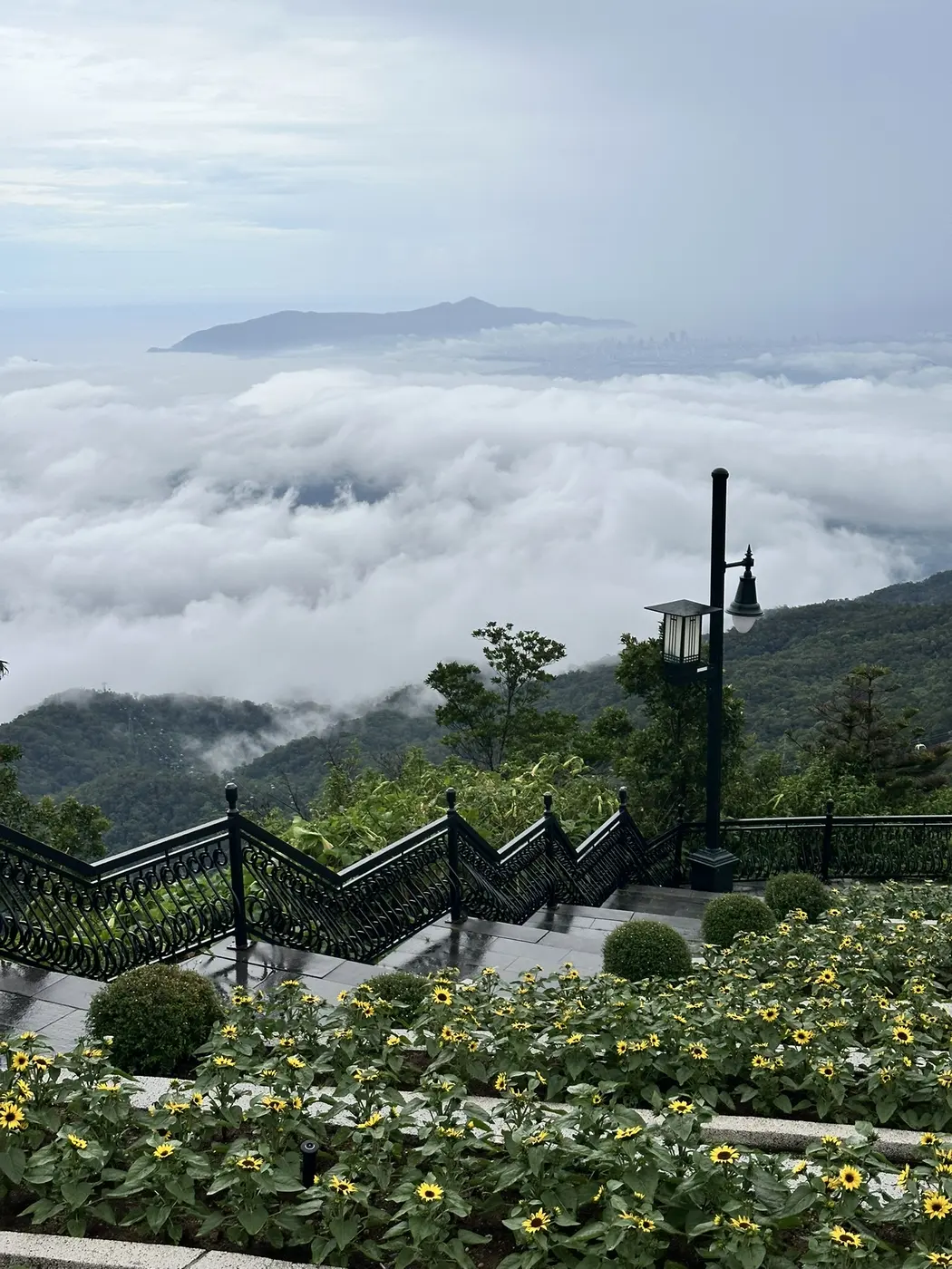 Stairway of the Ba Na Hills viewpoint above a sea of clouds near Da Nang