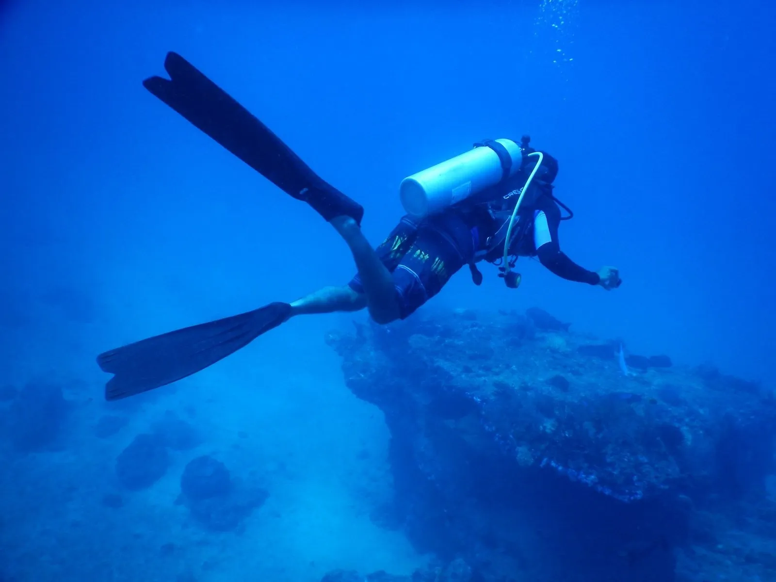 Scuba diver on coral reef at Cu Lao Cham marine reserve