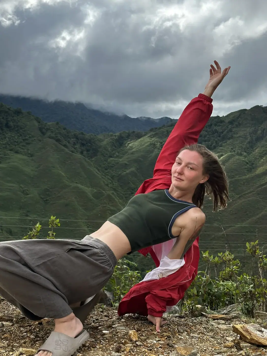 Five travelers posing at a mountain viewpoint in Moc Chau, northern Vietnam