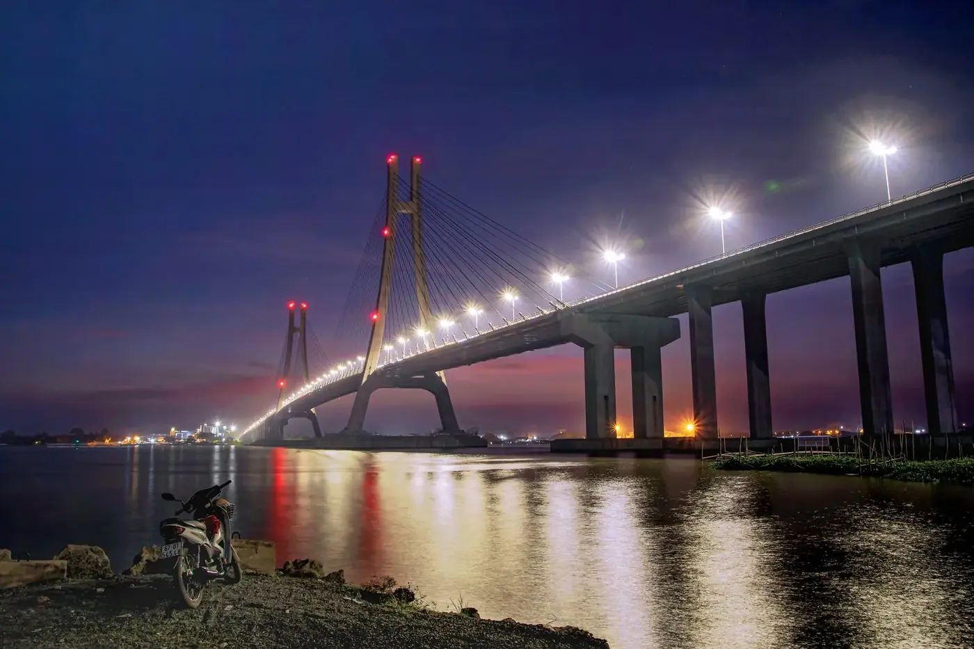 Illuminated Can Tho Bridge over the Mekong River at night