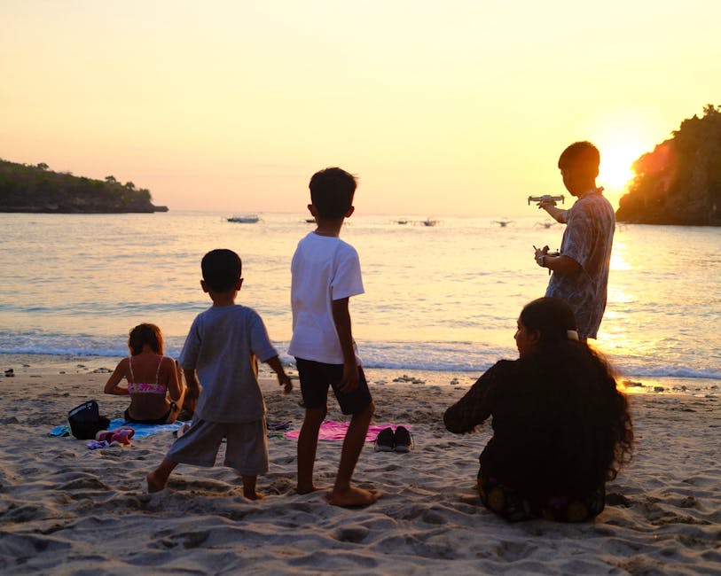 Expat family on a Southeast Asian beach at sunset