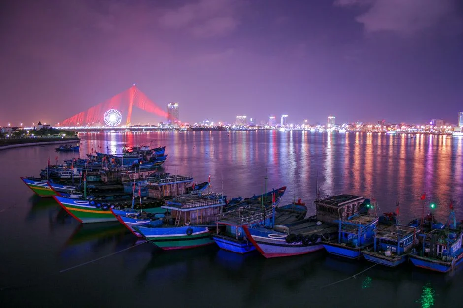 Da Nang’s Han River at night with illuminated bridge and city skyline