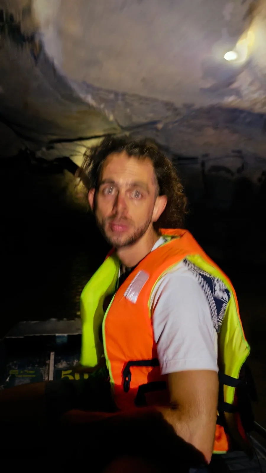 Close-up portrait wearing a life vest during a Ninh Binh boat tour
