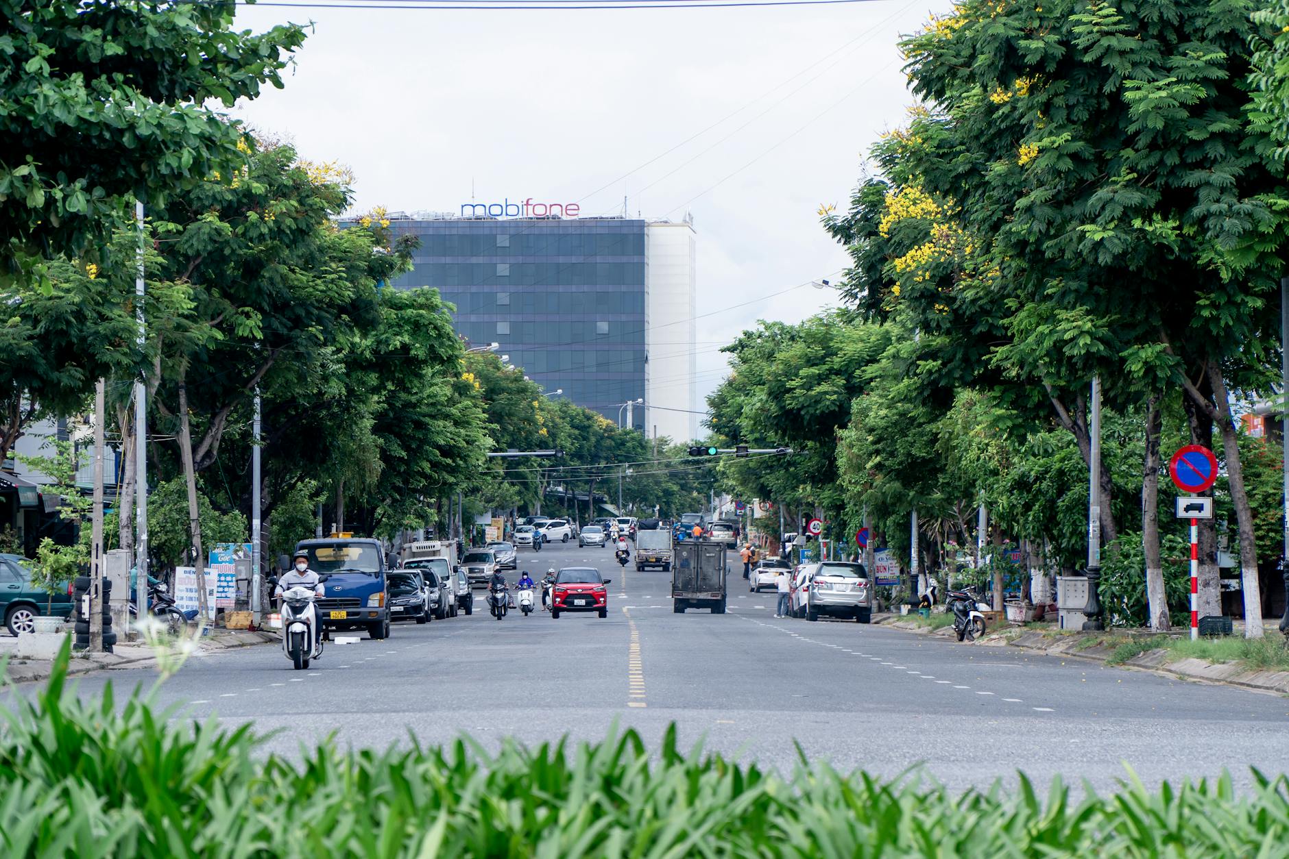 Da Nang street with motorbike traffic — transportation reality