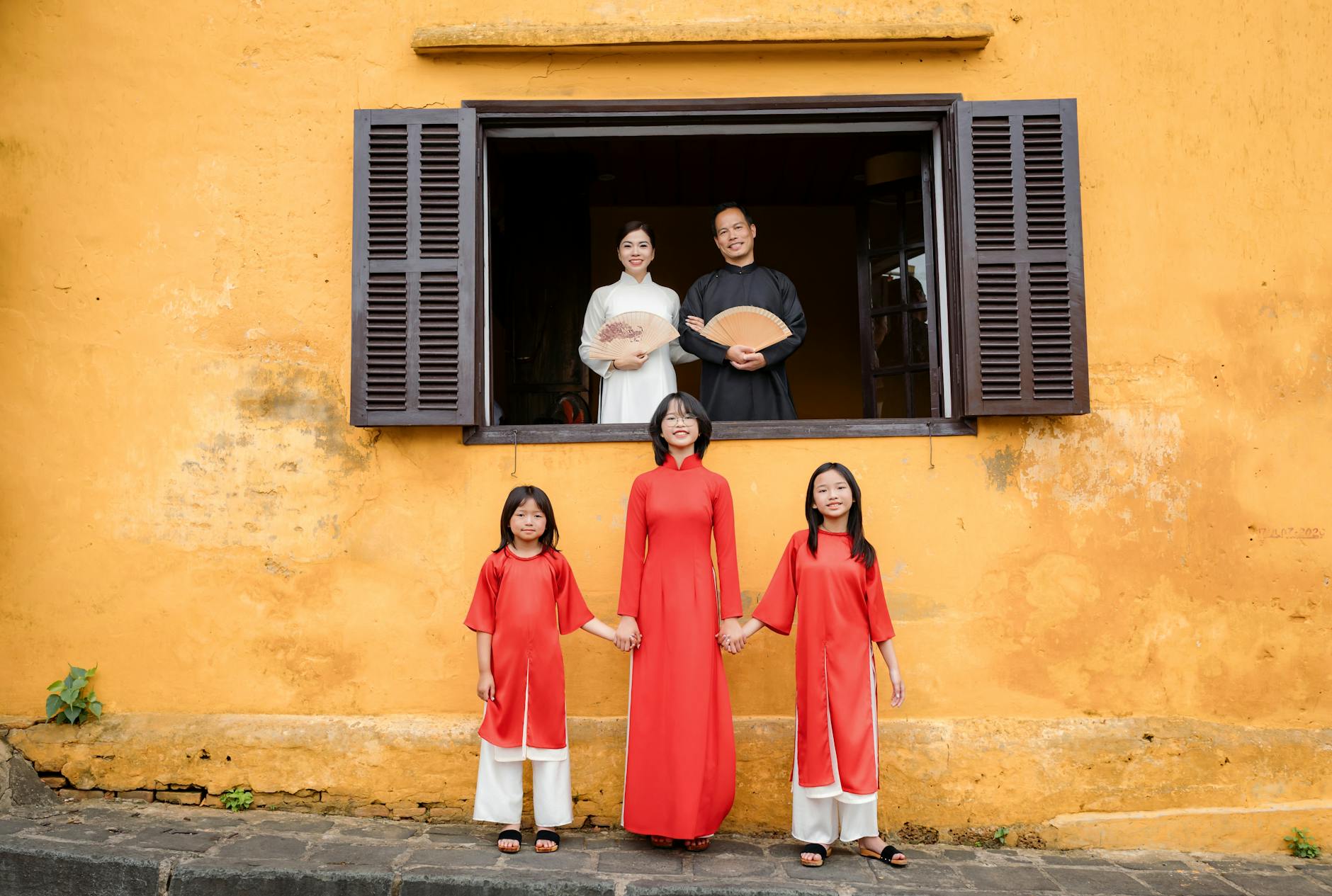 Vietnamese family in traditional dress — cultural integration