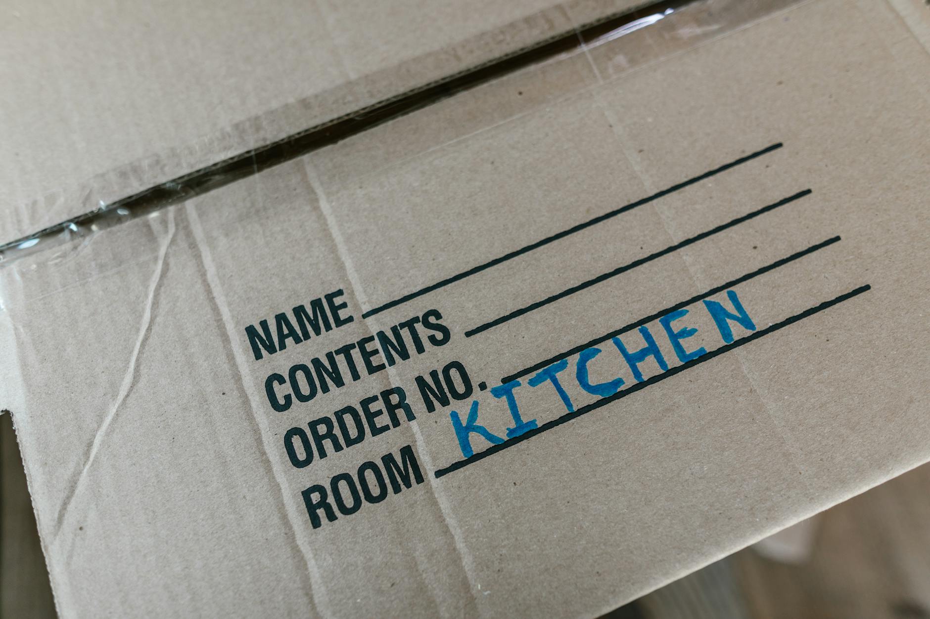 Moving boxes labeled for relocation — preparing to move to Vietnam