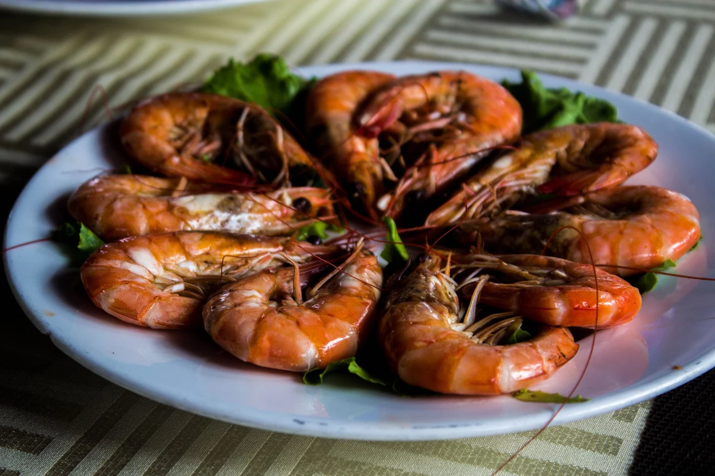 Plate of cooked prawns served at a Vietnamese seafood restaurant