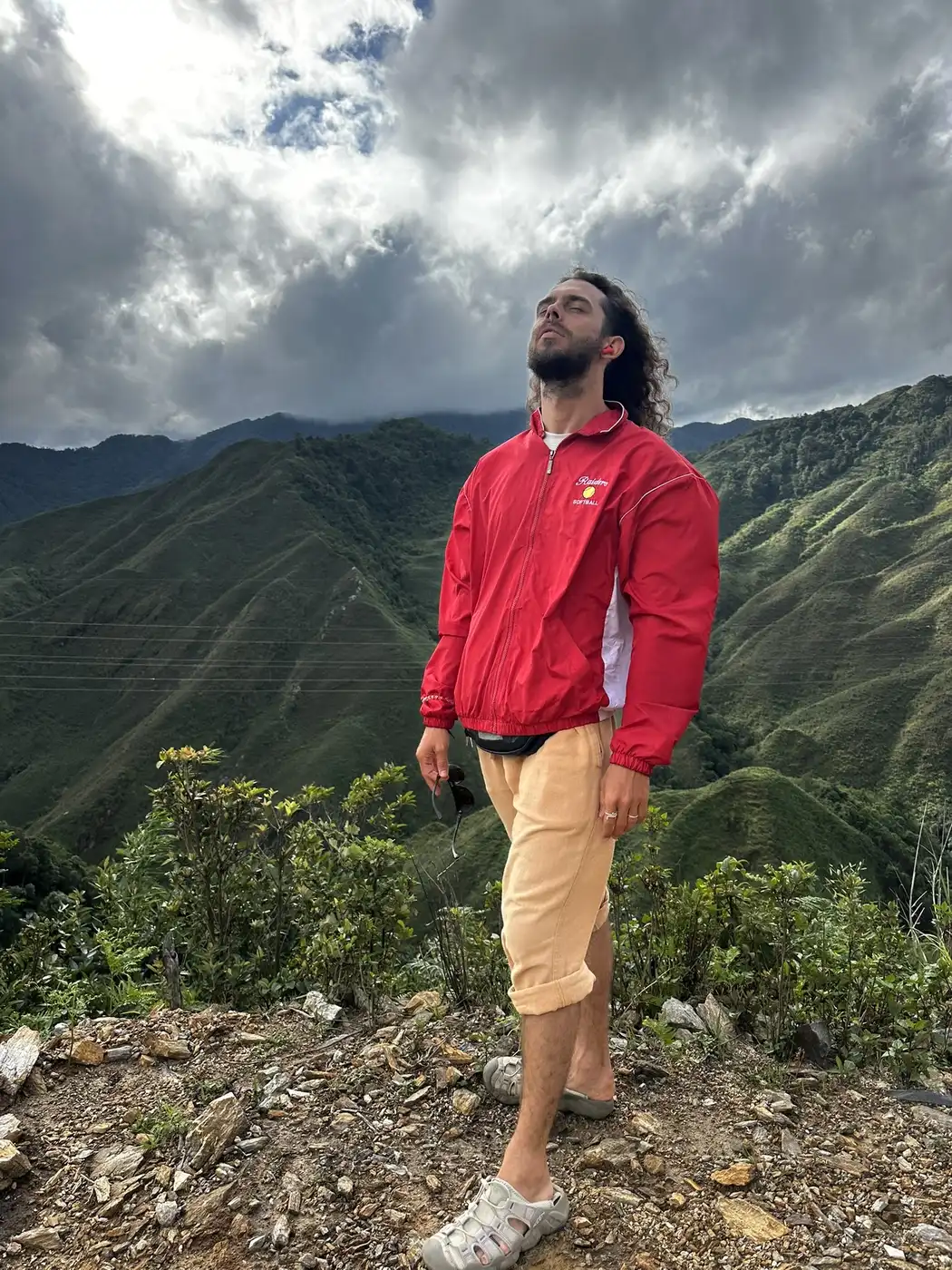 Traveler looking up at a Moc Chau viewpoint