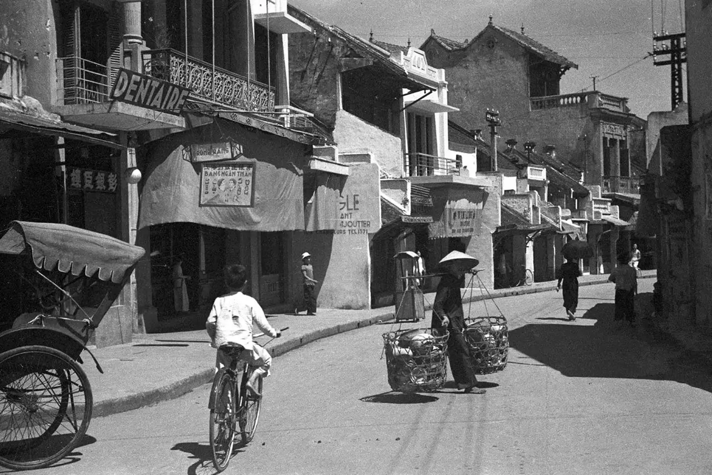 Cyclists on the historic streets of Ho Chi Minh City, southern Vietnam
