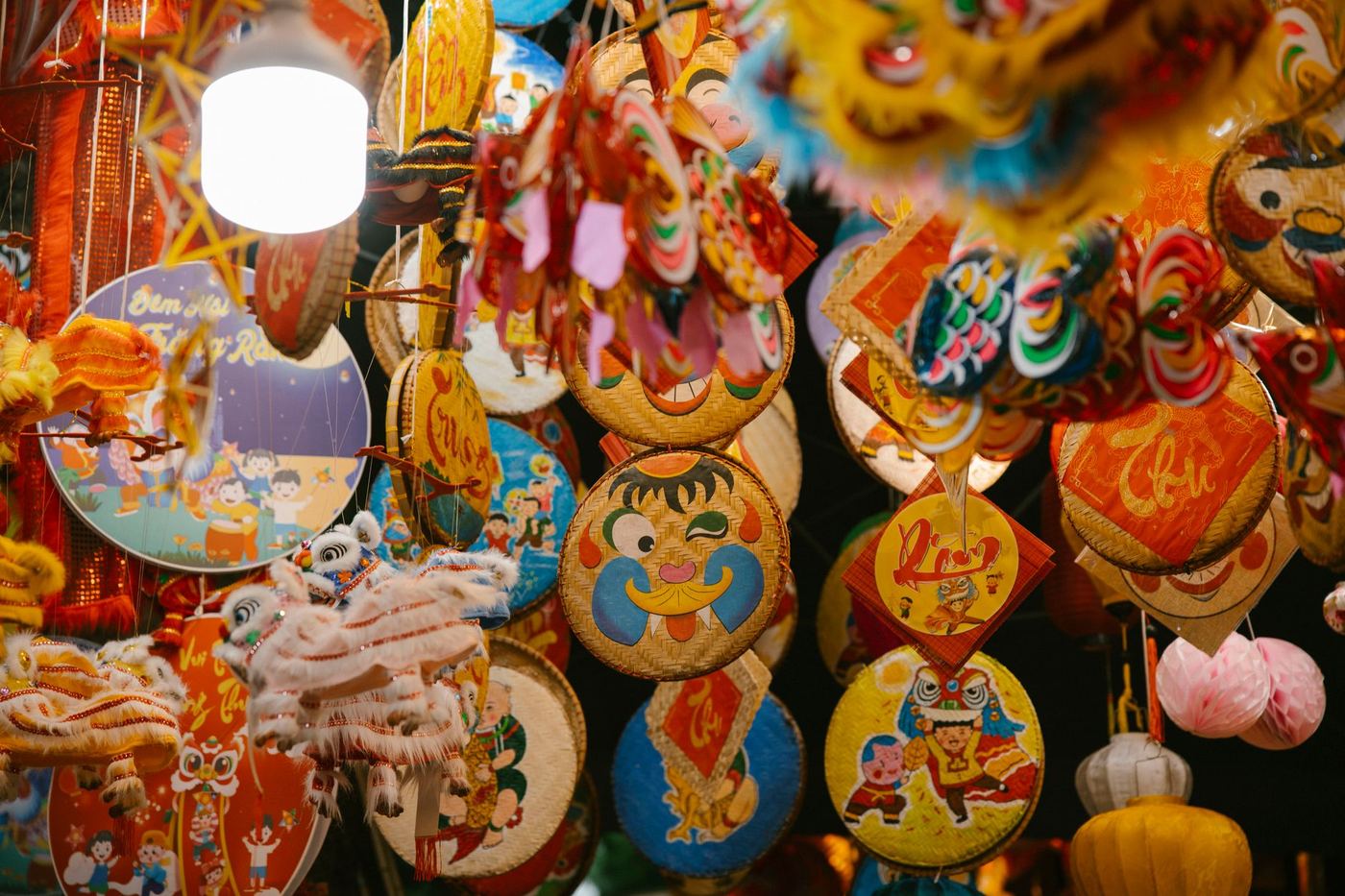Children in Vietnam carrying colorful star-shaped lanterns during the Mid-Autumn Festival celebration