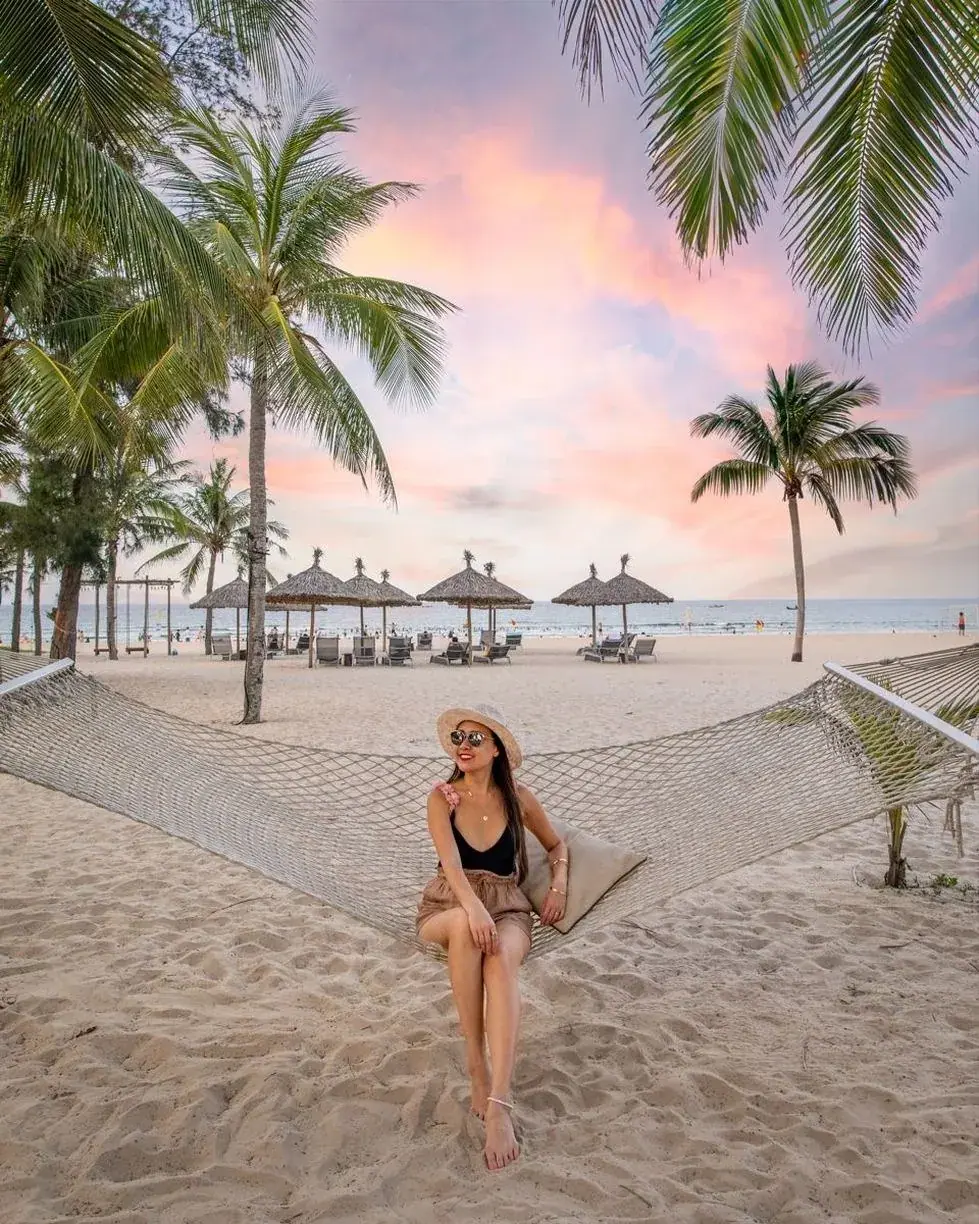 Hammock between palm trees on a Vietnam beach resort
