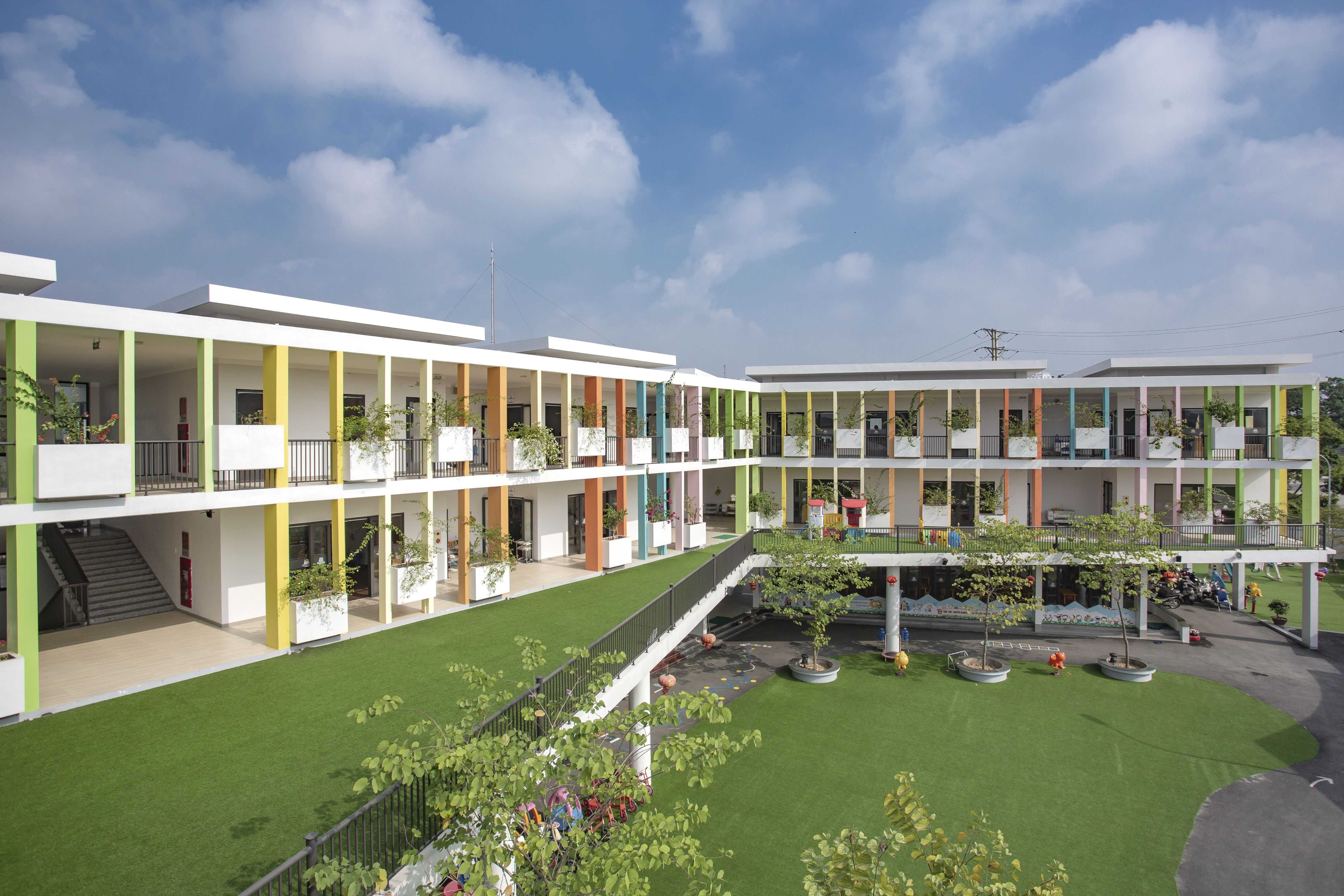 School courtyard view — hidden costs of enrollment