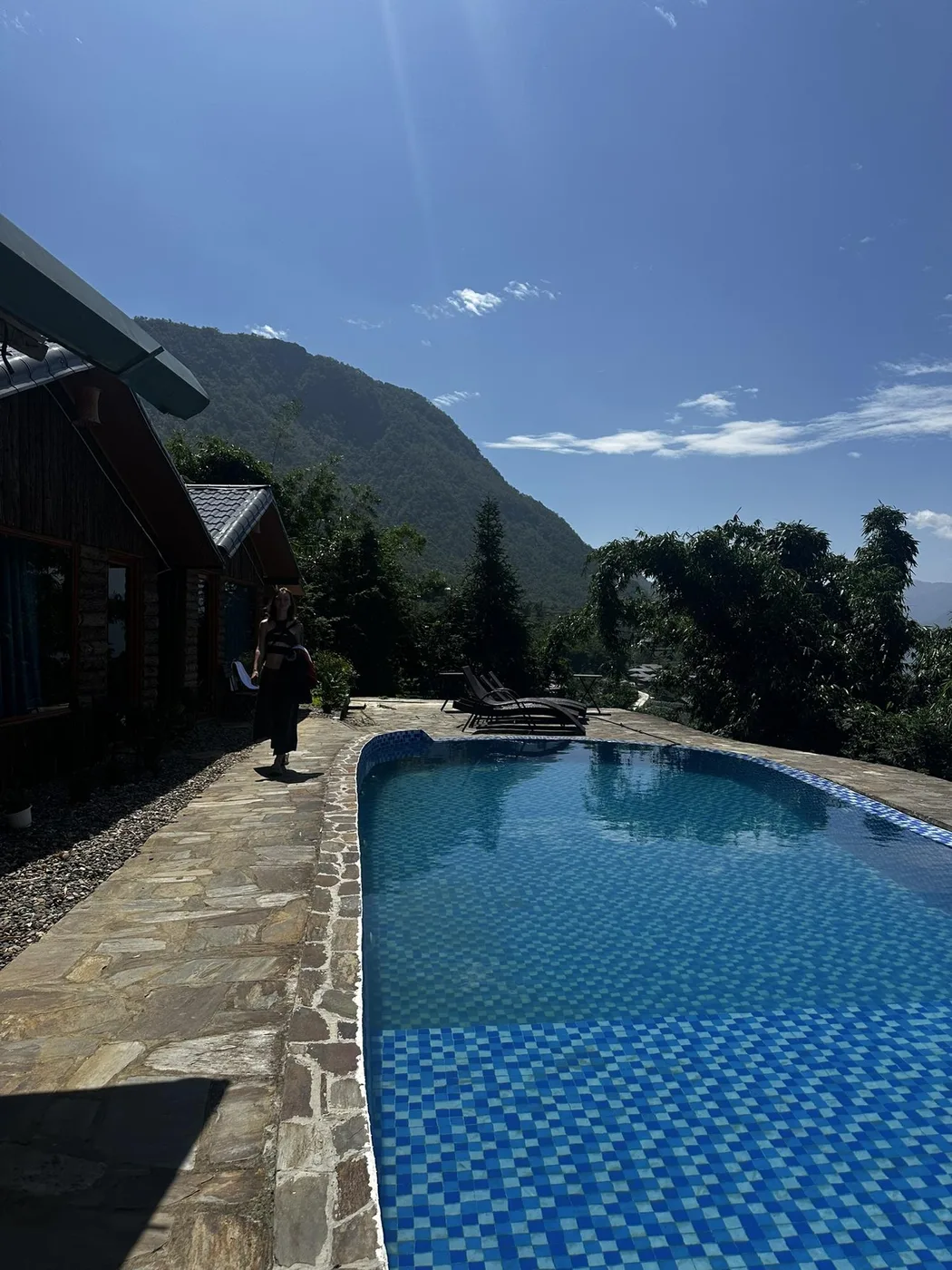 Infinity pool at a mountain resort overlooking Sapa’s peaks