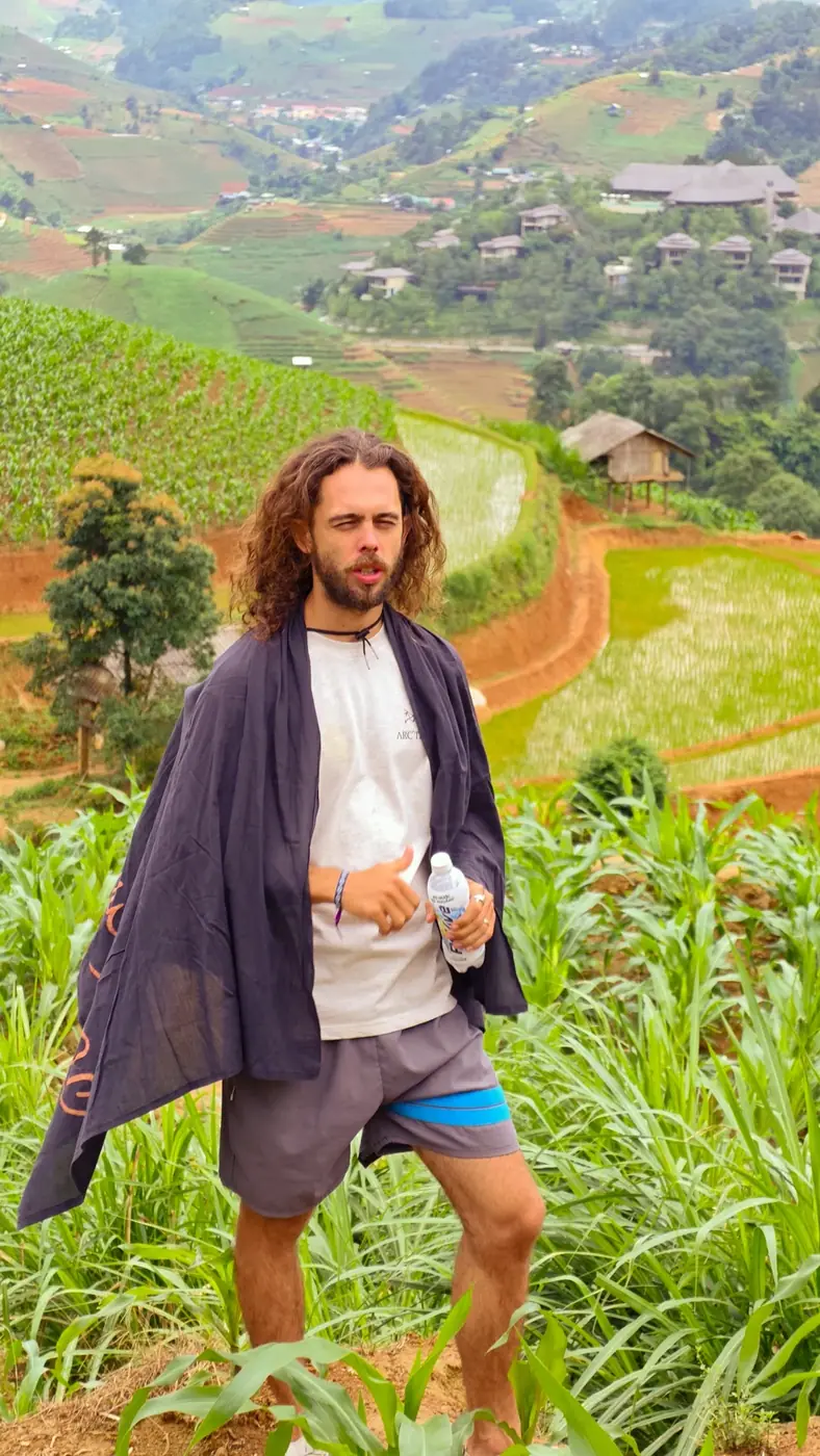 Traveler enjoying mountain scenery on an authentic Vietnam route
